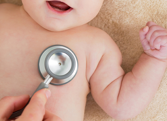 stethoscope on baby's chest